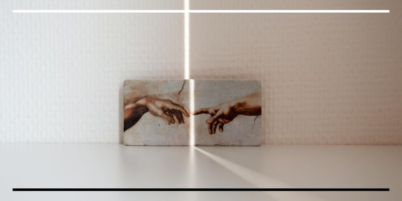 Representação de A criação de Adão do pintor Michelangelo